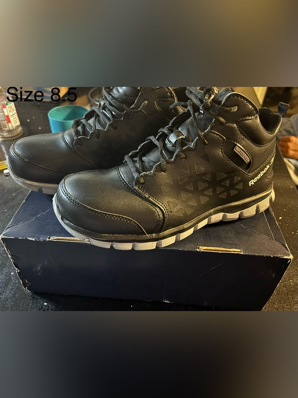 Reebok Men’s Black and White Athletic Mid-Top Sneakers
